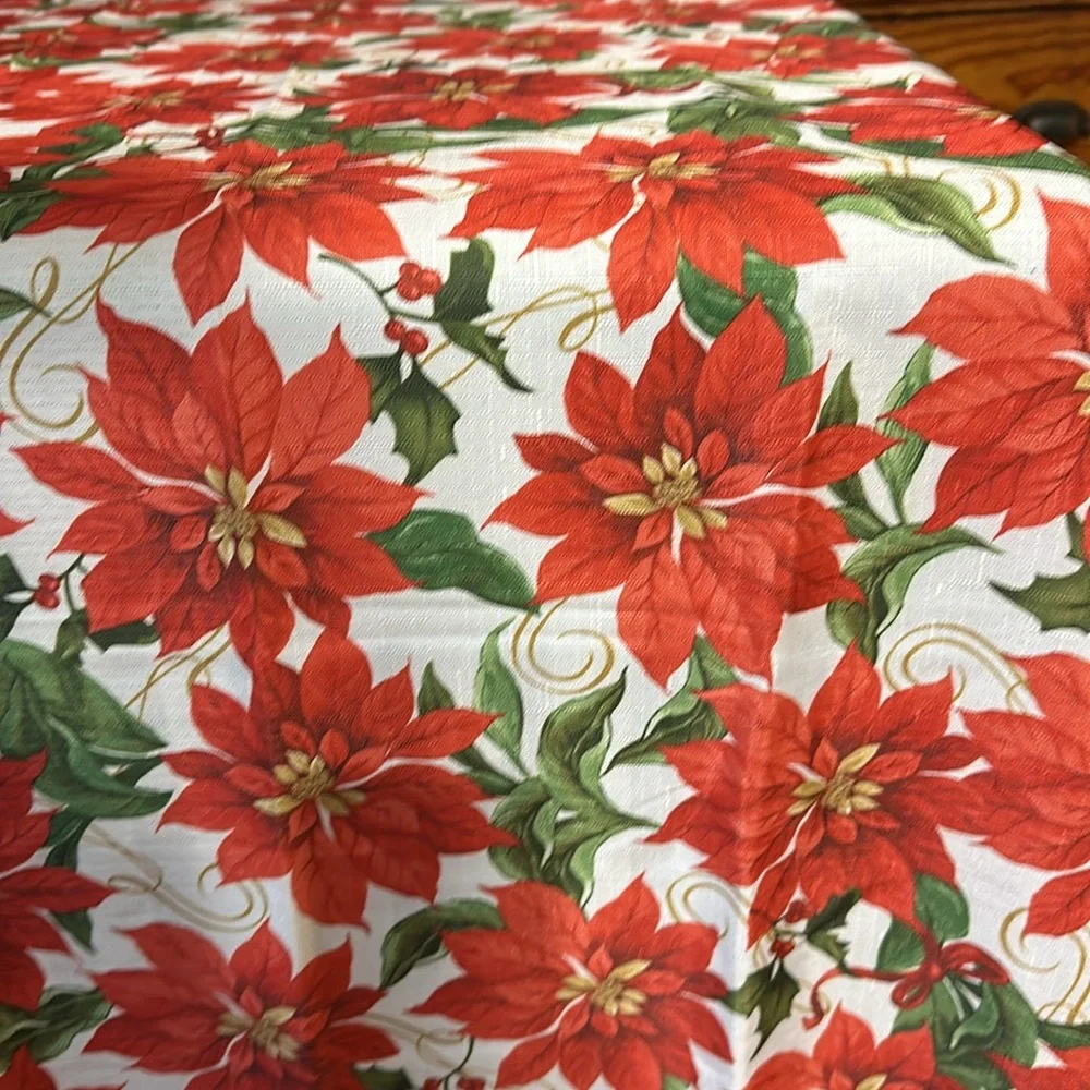 Poinsettia table cloth in EUC Red, green White and gold poinsettia’s and holly